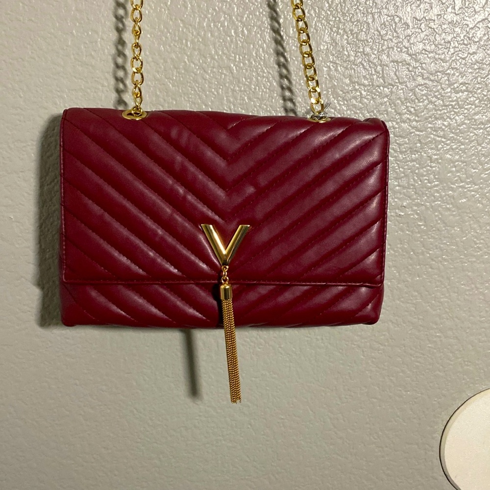 Crossi red crossbody bags